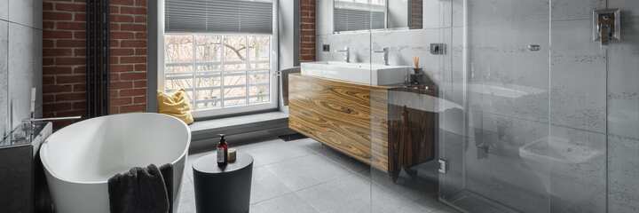 An industrial bathroom remodeling with oval bathtub for Macon, Georgia home